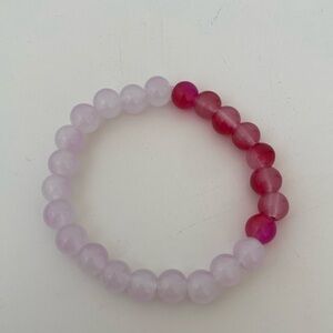 Light pink mixed with reddish hot pink